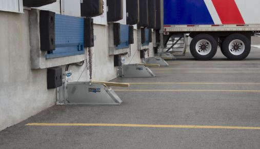 Loading dock truck restraints
