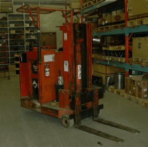 Old-forklift-in-warehouse