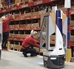 Automated mobile robots in pick and pack warehouse
