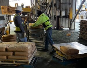 physically demanding manual palletizing